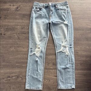 Distressed Light Blue Mid Rise Women's Jeans